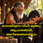 A young Indian boy dressed in traditional black Sabarimala pilgrim attire respectfully folds his hands in prayer as an elderly Guruswami places a holy beaded mala around his neck.